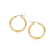 Load image into Gallery viewer, 14k Yellow Gold Fancy Diamond Cut Slender Small Hoop Earrings (15mm Diameter)
